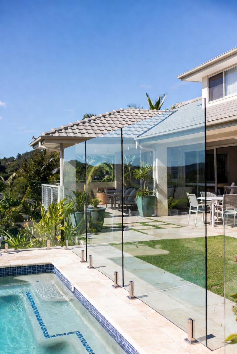 Frameless glass pool fence with panoramic ocean view Noosa Heads